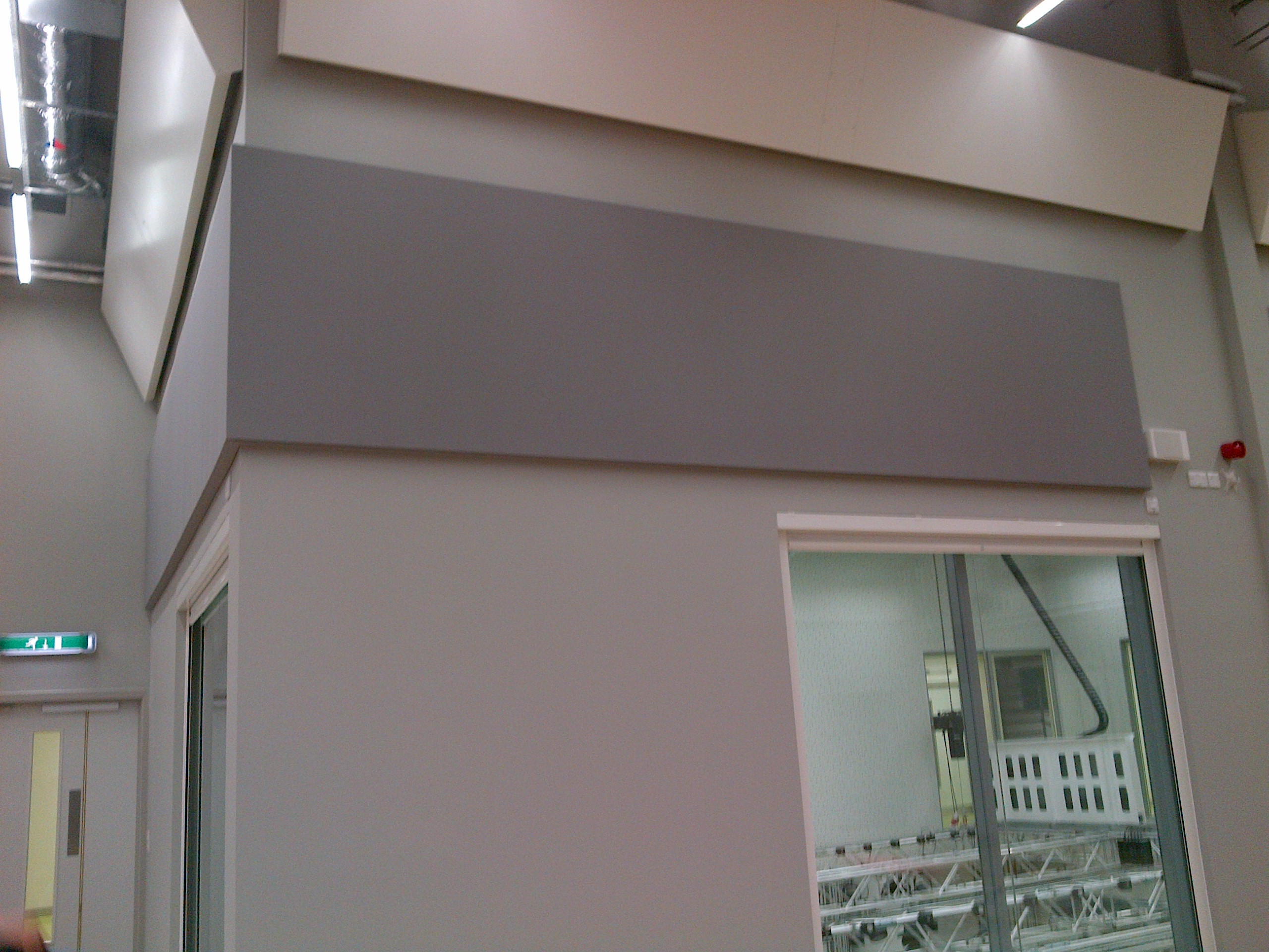 Fabric acoustic wall panels installed in a healthcare interior