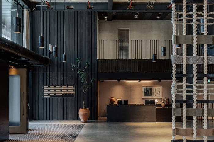 Timber slatted acoustic treatment in a hospitality and leisure interior
