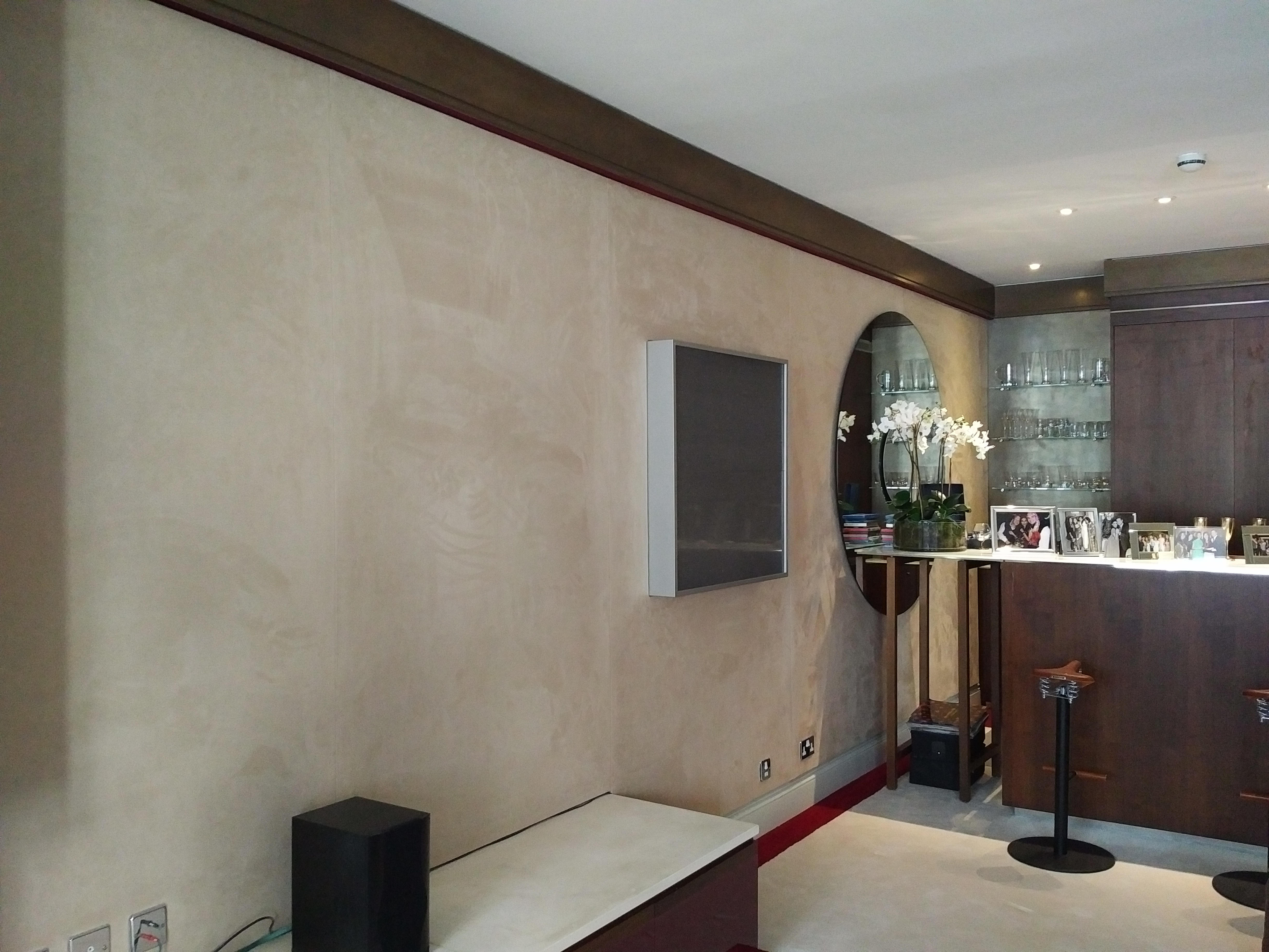 Specialist acoustic wall finish integrated into a hospitality interior